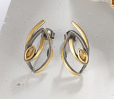 A pair of silver earrings, gold plated with yellow citrine stones.
